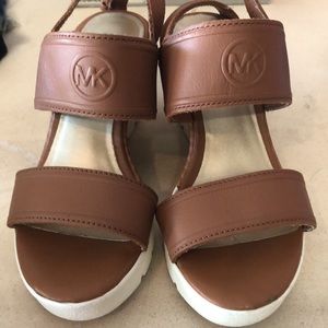 Girls size 12 Michael Kors wedges. Gently used.